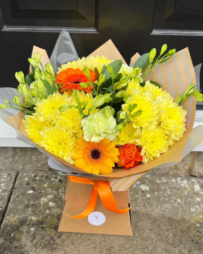 Lemon & Lime - A beautiful collection of flowers simply wrapped and ready to arrange.